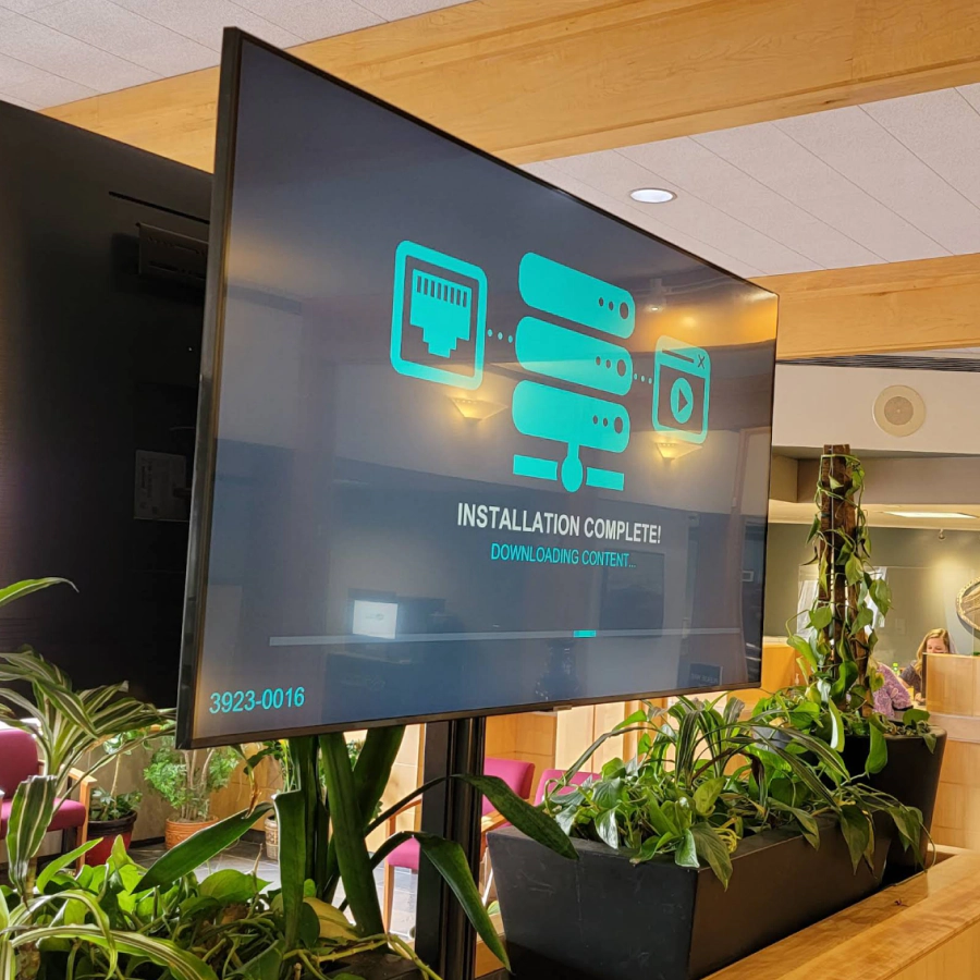Commercial flat screen TV installation in a business setting